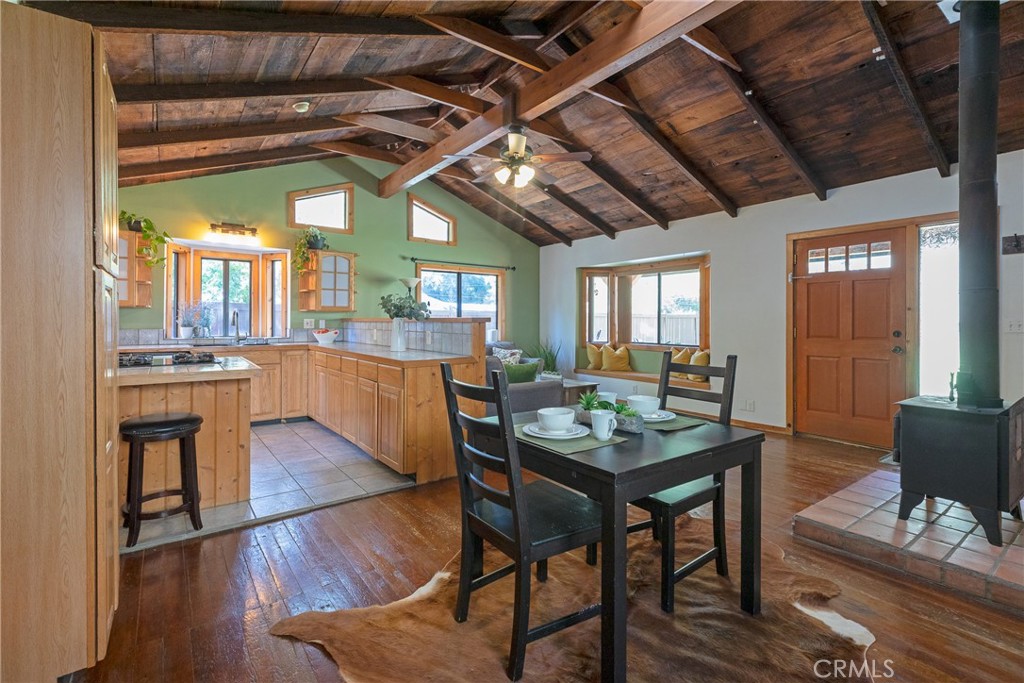 31311 Silverado Canyon Road Silverado, CA 92676 - Photo 25 of 37 a view of a dining room with furniture window and wooden floor