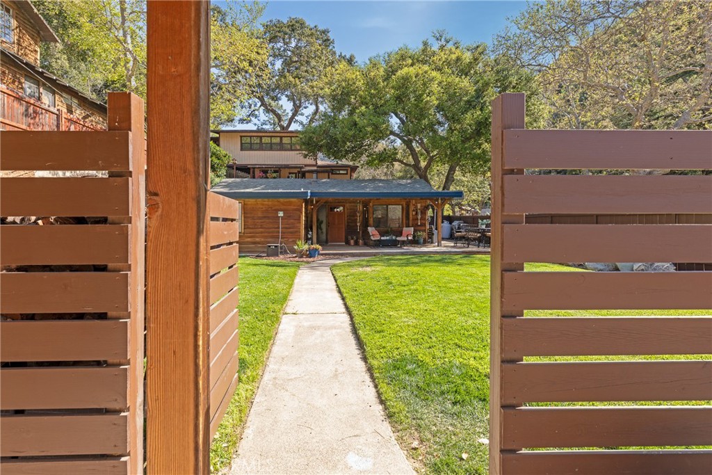 31311 Silverado Canyon Road Silverado, CA 92676 - Photo 3 of 37 a front view of a house with a yard