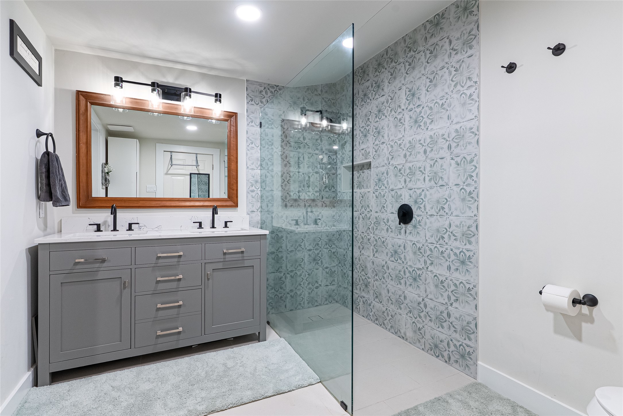 11010 3rd Street Jonestown, TX 78645 - Photo 11 of 20 Bright and stylish primary bathroom with contemporary touches