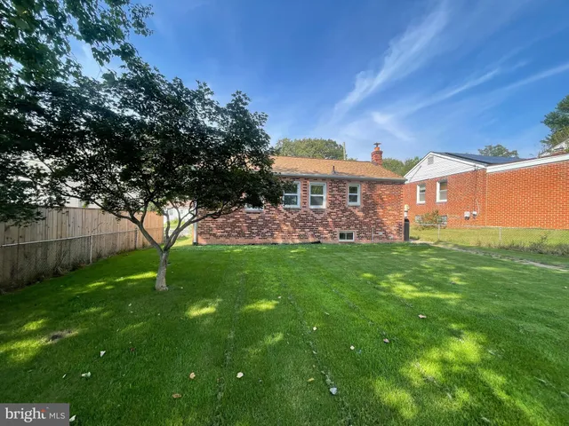 a view of a backyard with a garden