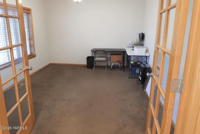 a view of livingroom with furniture and staircase