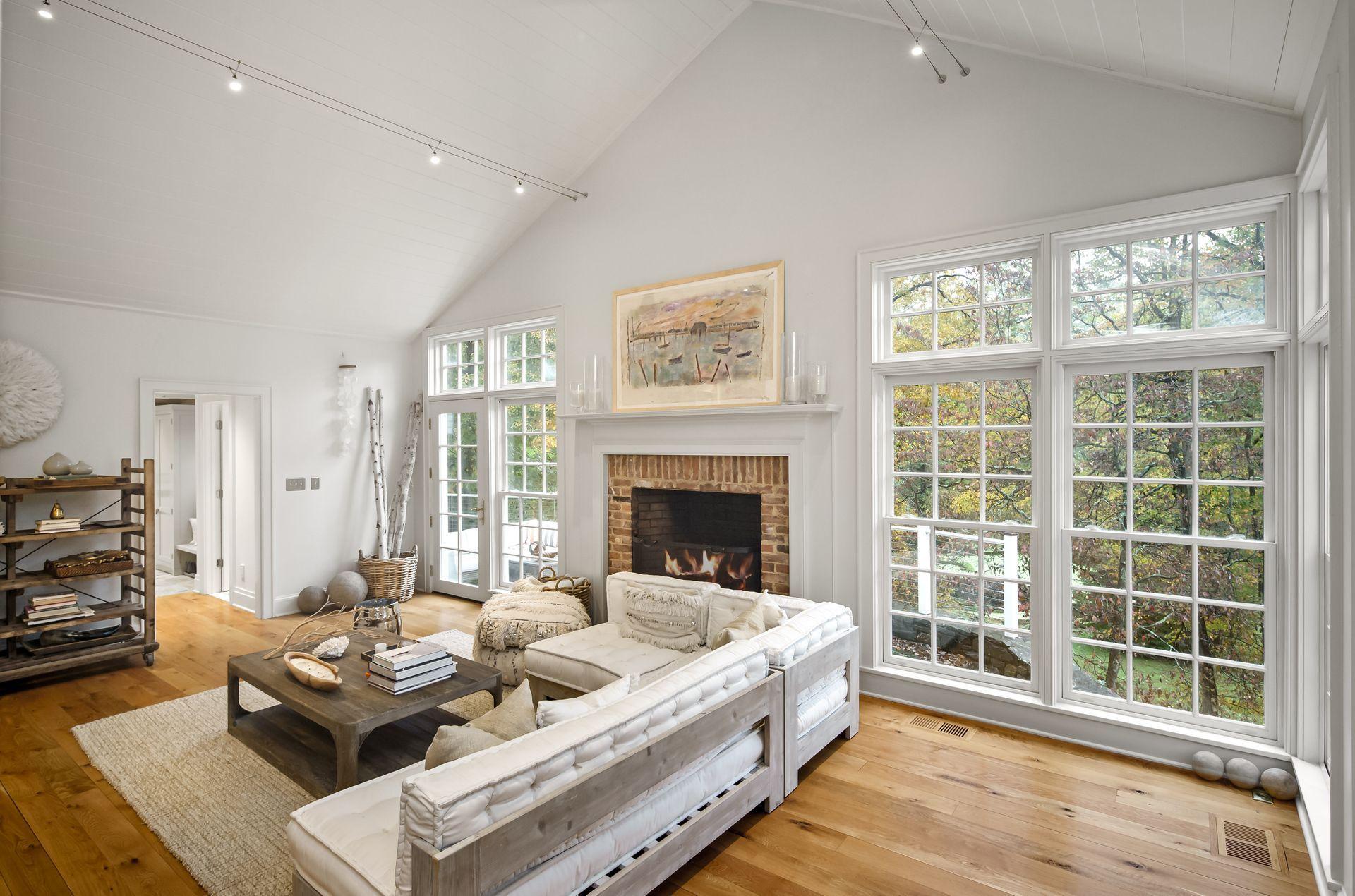 33 Tory Hole Road Darien, CT 06820 - Photo 17 of 51 a living room with furniture and a large window