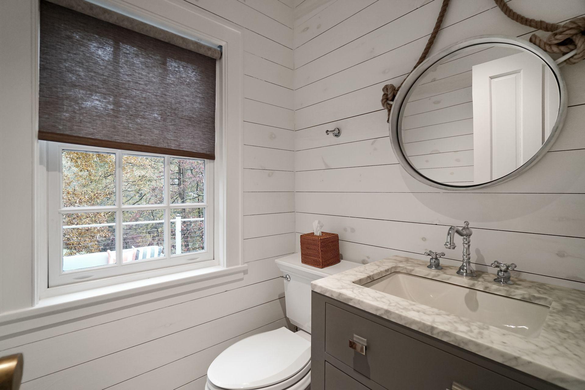 33 Tory Hole Road Darien, CT 06820 - Photo 25 of 51 a bathroom with a granite countertop sink and a mirror