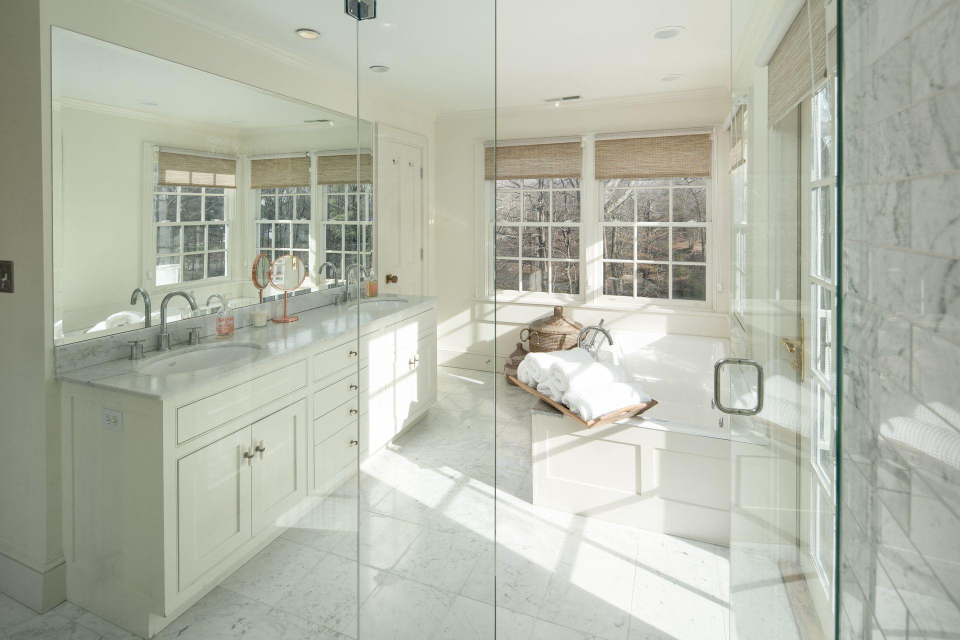 33 Tory Hole Road Darien, CT 06820 - Photo 28 of 51 a bathroom with a granite countertop sink and mirror