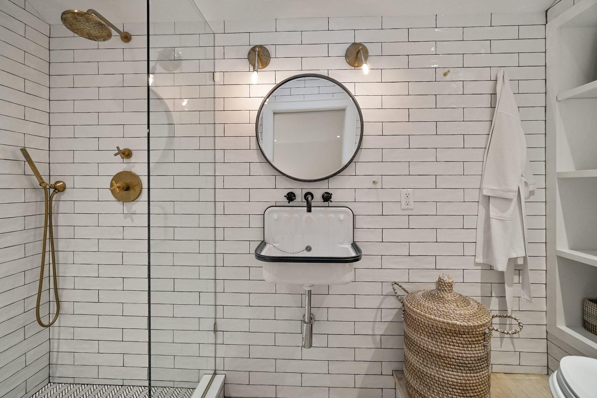 33 Tory Hole Road Darien, CT 06820 - Photo 34 of 51 a bathroom with a sink toilet and mirror