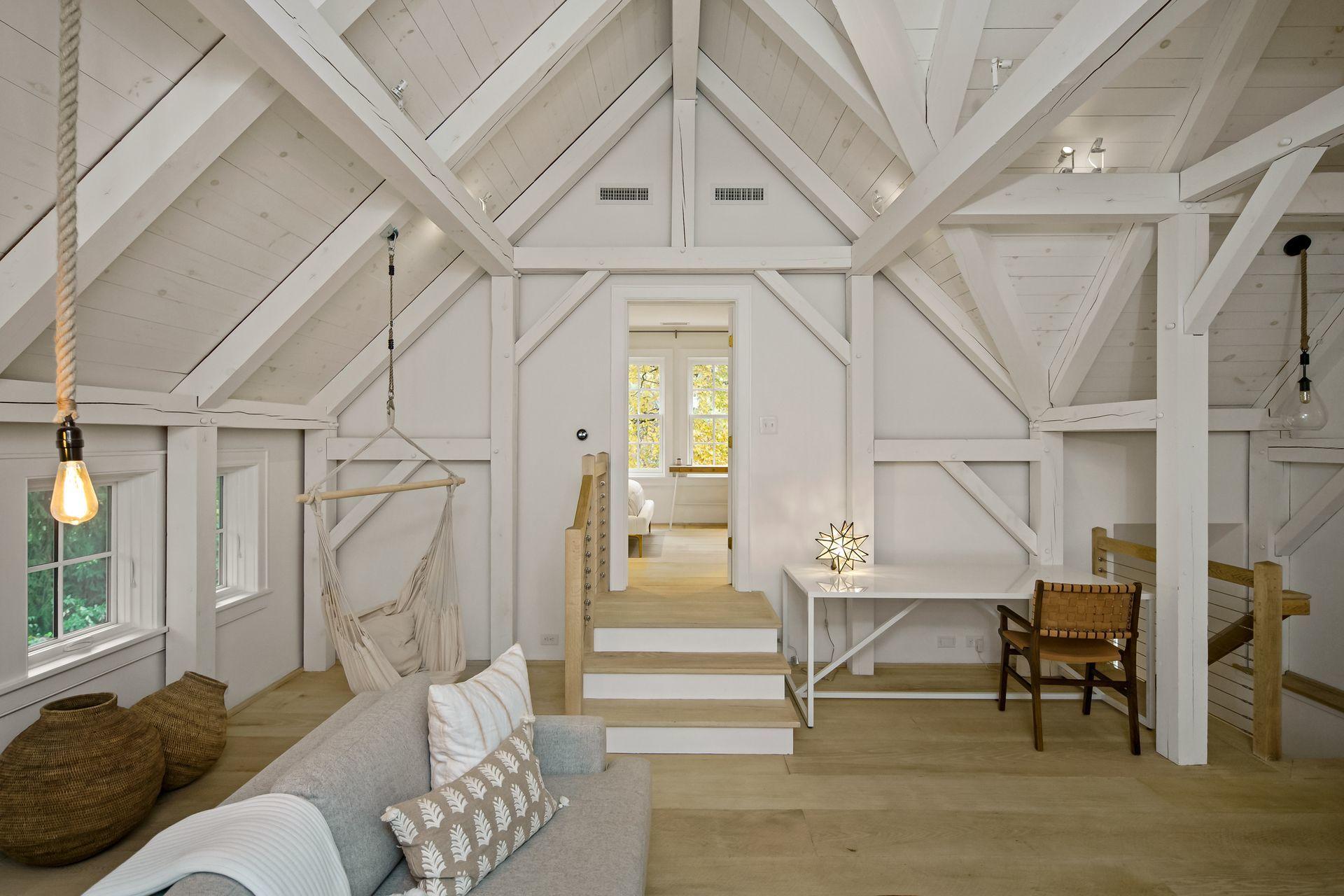 33 Tory Hole Road Darien, CT 06820 - Photo 38 of 51 a living room with wooden floor and furniture