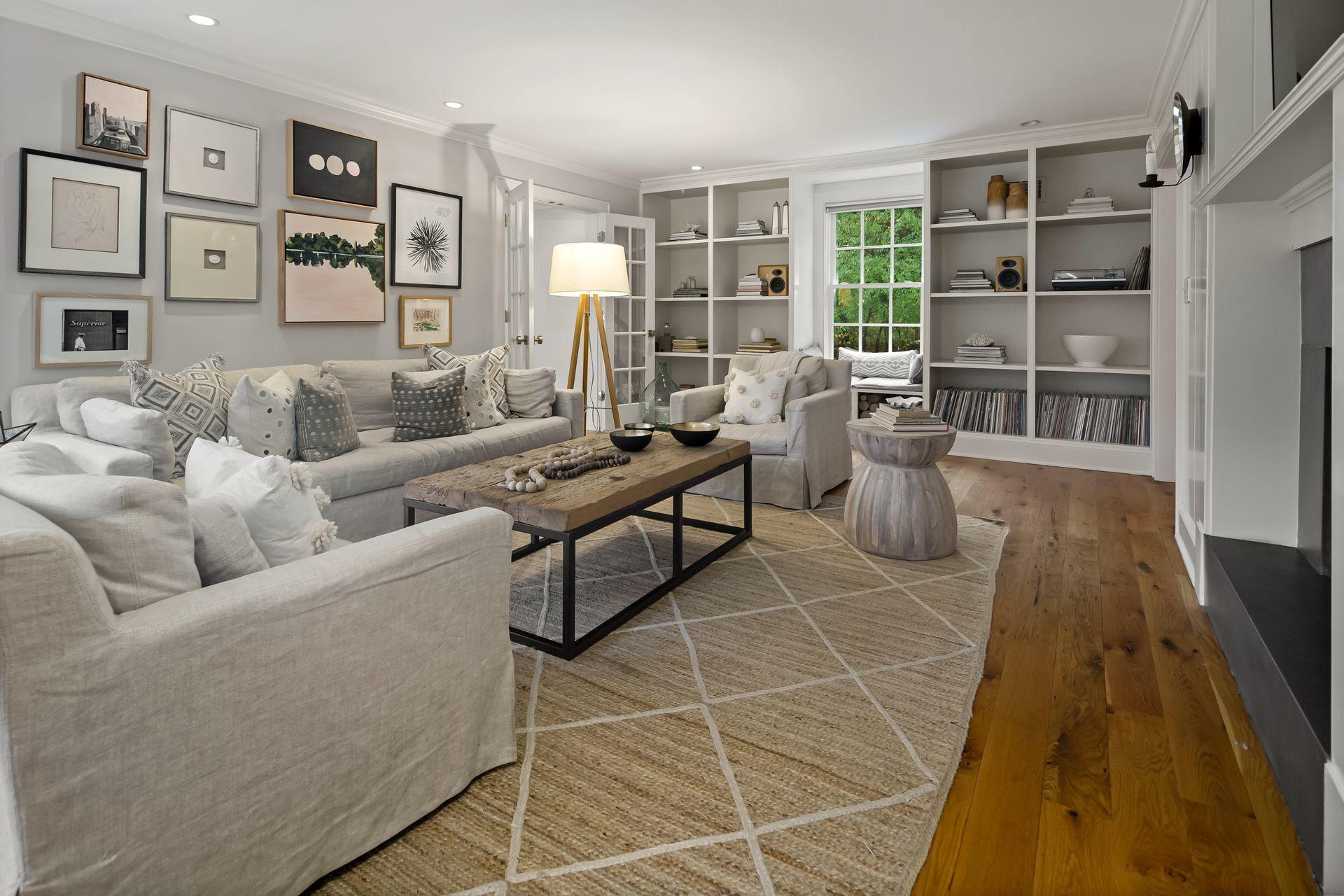 33 Tory Hole Road Darien, CT 06820 - Photo 7 of 51 a living room with furniture a rug and a table