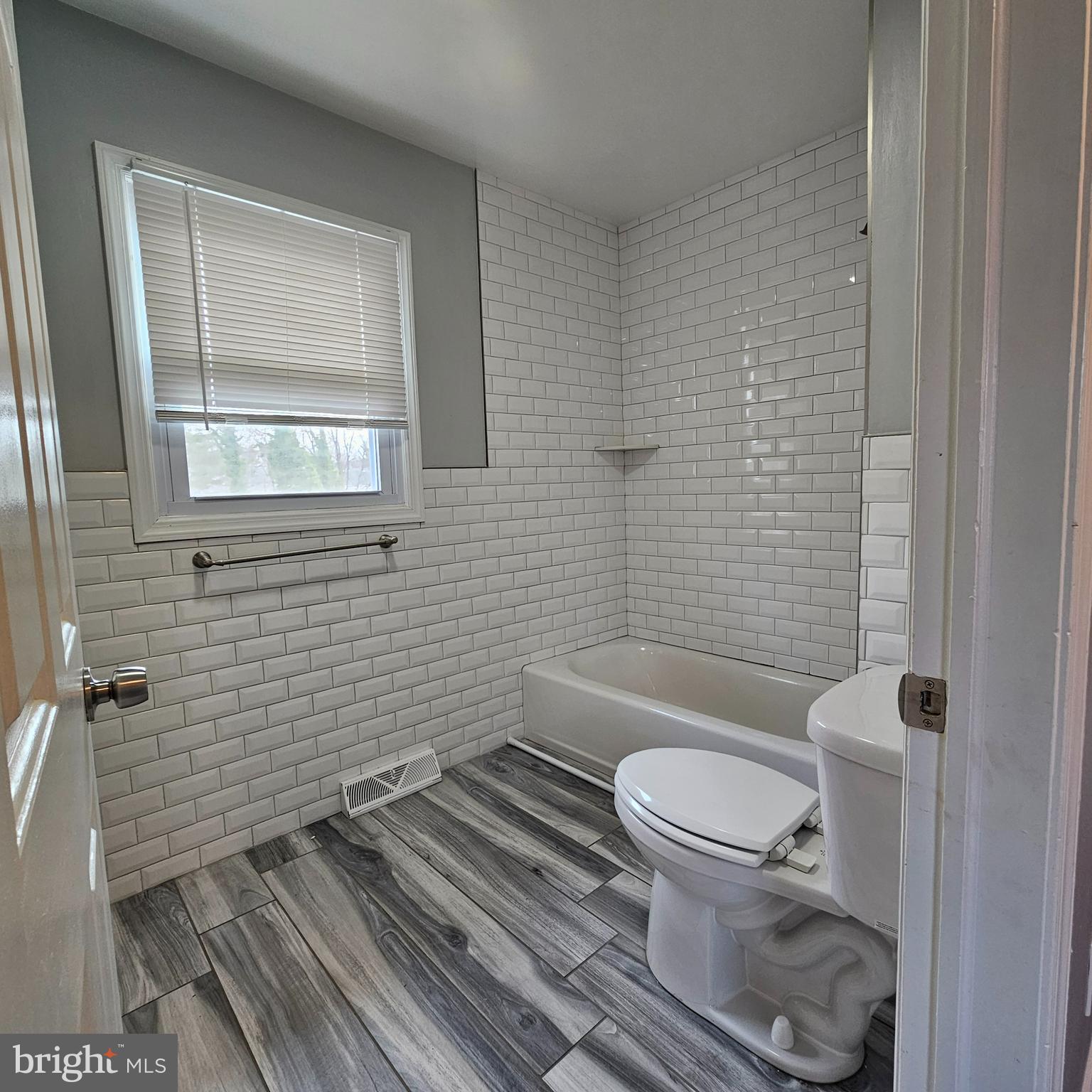 1565 South Main Road Vineland, NJ 08360 - Photo 13 of 15 a bathroom with a toilet and a sink