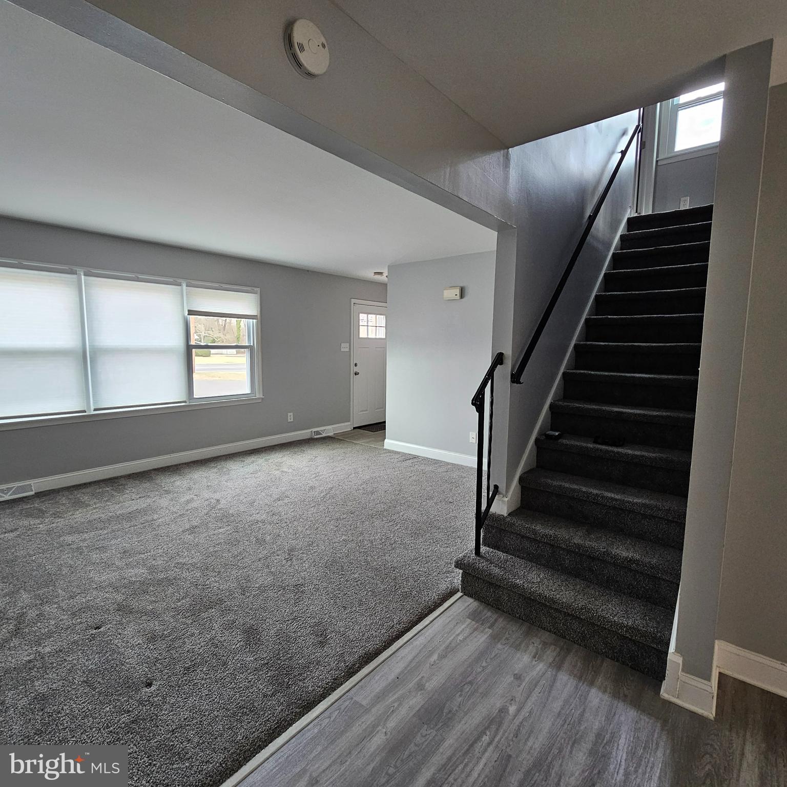 1565 South Main Road Vineland, NJ 08360 - Photo 7 of 15 wooden floor in an empty room with a window