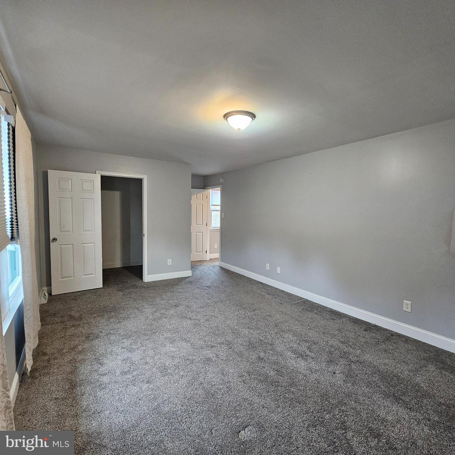 1565 South Main Road Vineland, NJ 08360 - Photo 10 of 15 an empty room with windows and closet