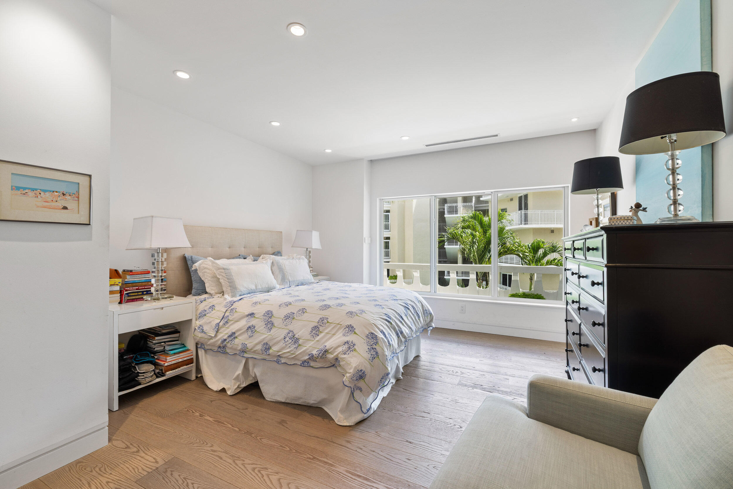 300 South Ocean Boulevard, Unit 3F Palm Beach, FL 33480 - Photo 17 of 27 a bedroom with a bed and a couch