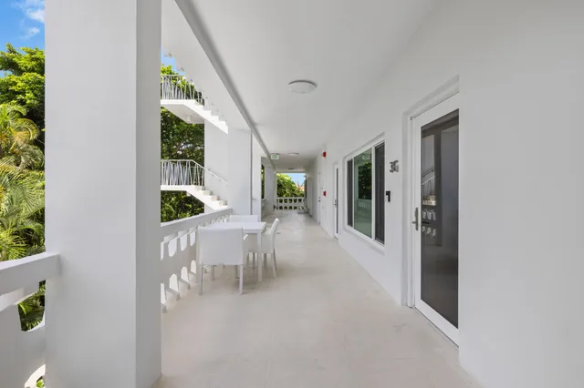 an entryway with dining room and livingroom view