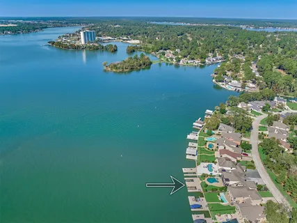 an aerial view of lake residential house with outdoor space