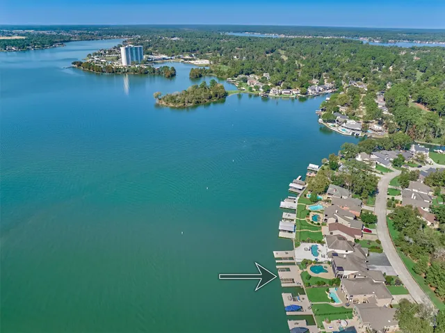 an aerial view of lake residential house with outdoor space