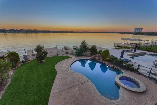 a view of a swimming pool with a patio