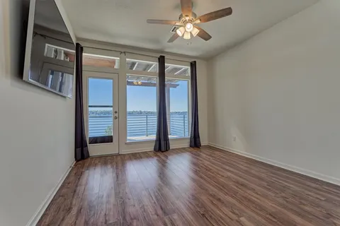 a view of swimming pool from a balcony
