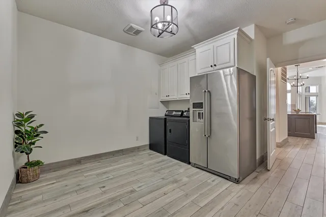 a picture of a bathroom with mirror