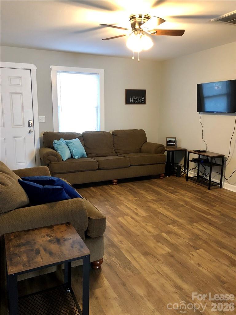 1536 Beth Haven Church Road Denver, NC 28037 - Photo 5 of 11 a living room with furniture and a wooden floor