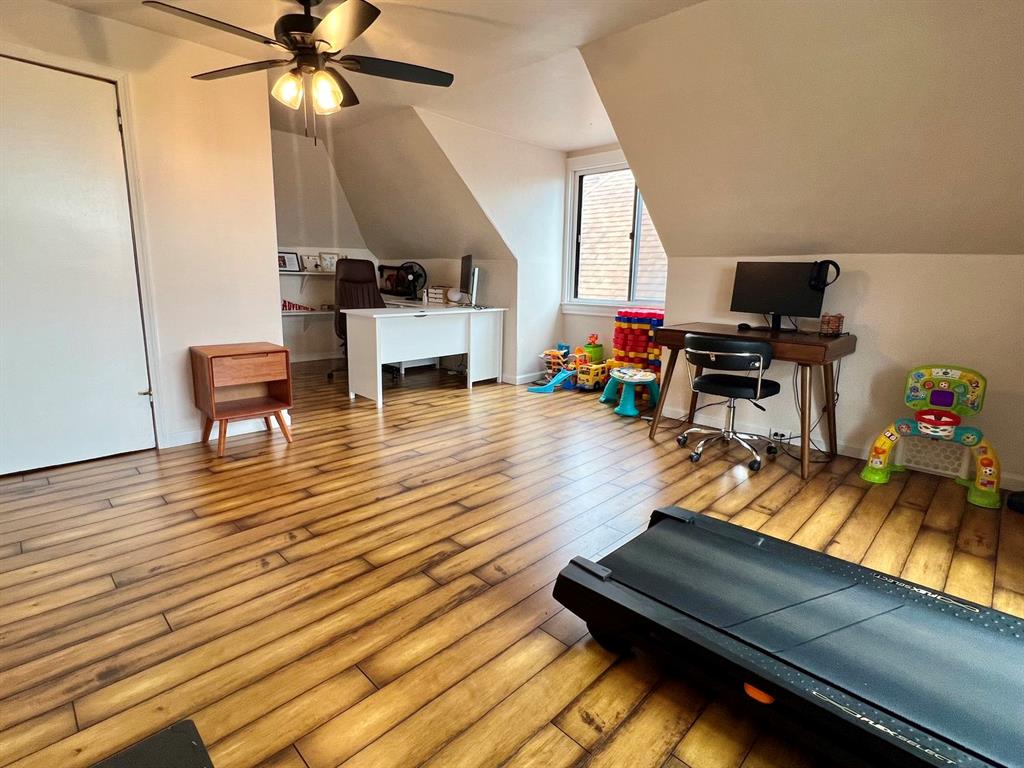 237 Lelia Street Pittsburgh, PA 15211 - Photo 38 of 46 a living room with furniture and a wooden floor