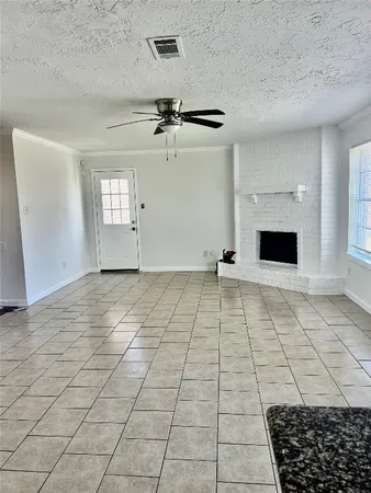 a view of empty room with windows