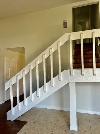 a view of an entryway with staircase