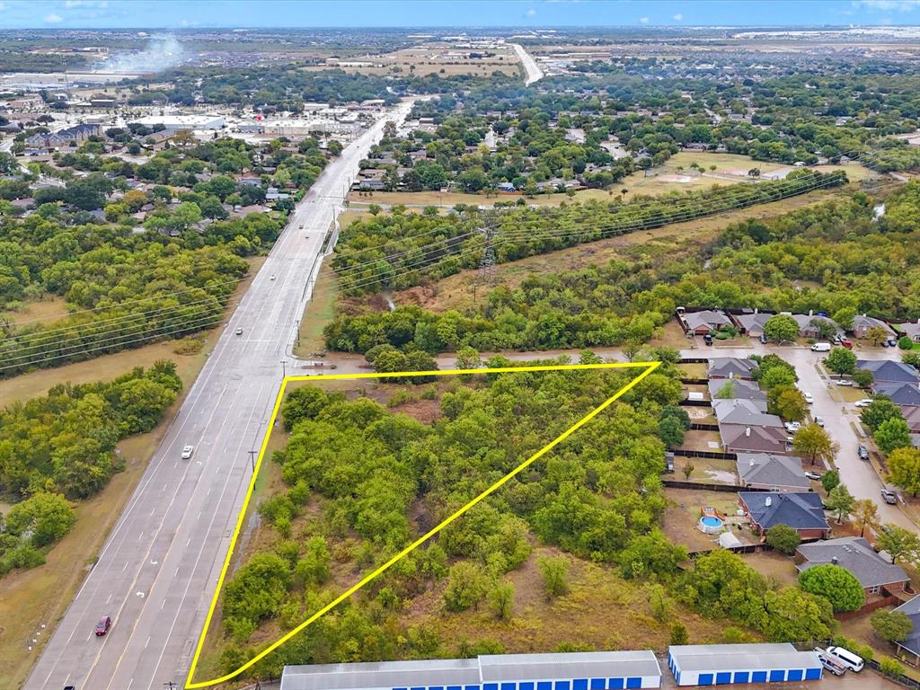 713 South Crowley Road Crowley, TX 76036 - Photo 1 of 24 an aerial view of residential houses with outdoor space