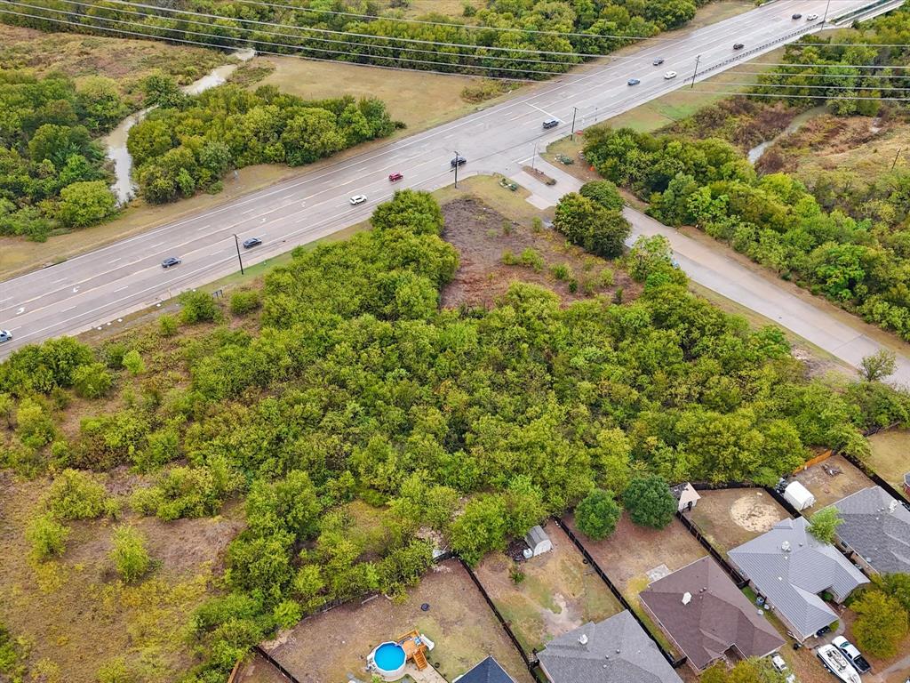 713 South Crowley Road Crowley, TX 76036 - Photo 16 of 24 a view of a yard with potted plants