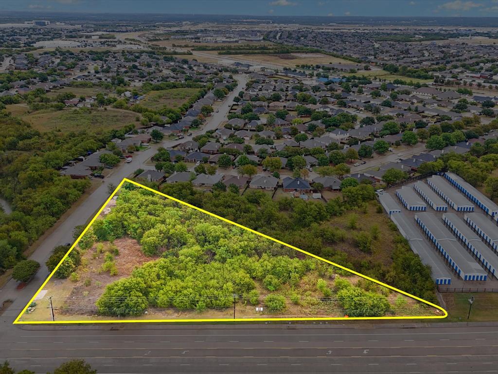 713 South Crowley Road Crowley, TX 76036 - Photo 4 of 24 an aerial view of a residential houses with yard