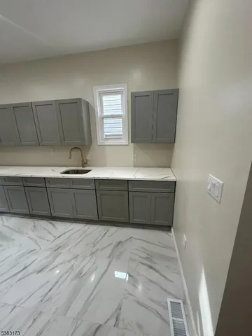 a view of a hallway to a bedroom and a bedroom