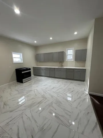a view of counter top space and windows in a room