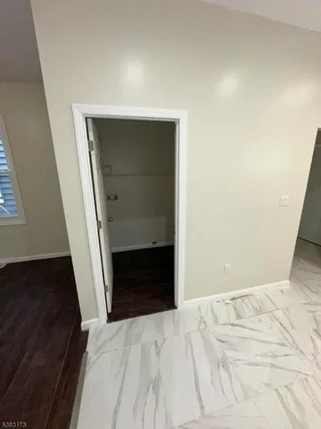 a bathroom with a shower and a toilet