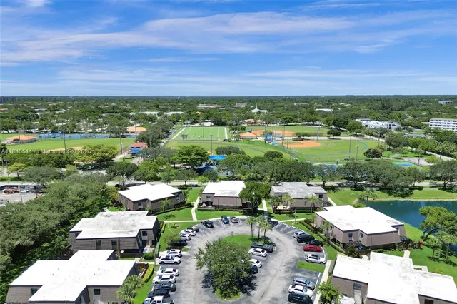 an aerial view of a house with a garden