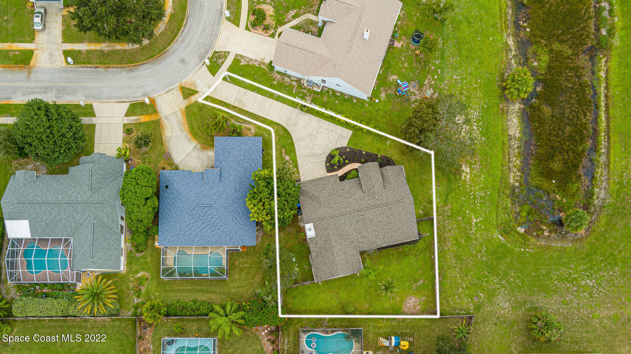 960 Falls Trail Malabar, FL 32950 - Photo 4 of 70 an aerial view of a house with a garden