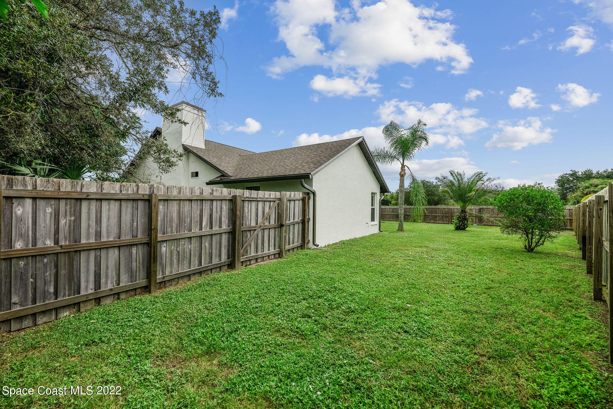 960 Falls Trail Malabar, FL 32950 - Photo 56 of 70 a view of a backyard with a garden