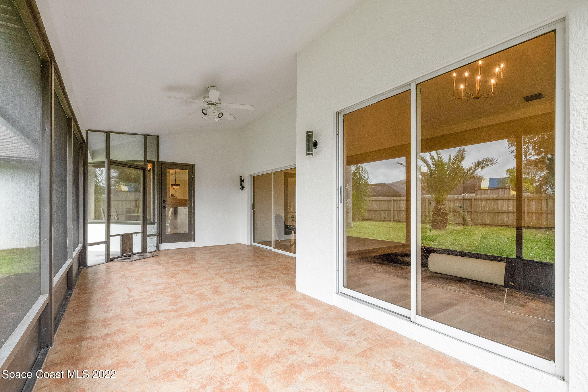 960 Falls Trail Malabar, FL 32950 - Photo 57 of 70 a view of an empty room with glass windows