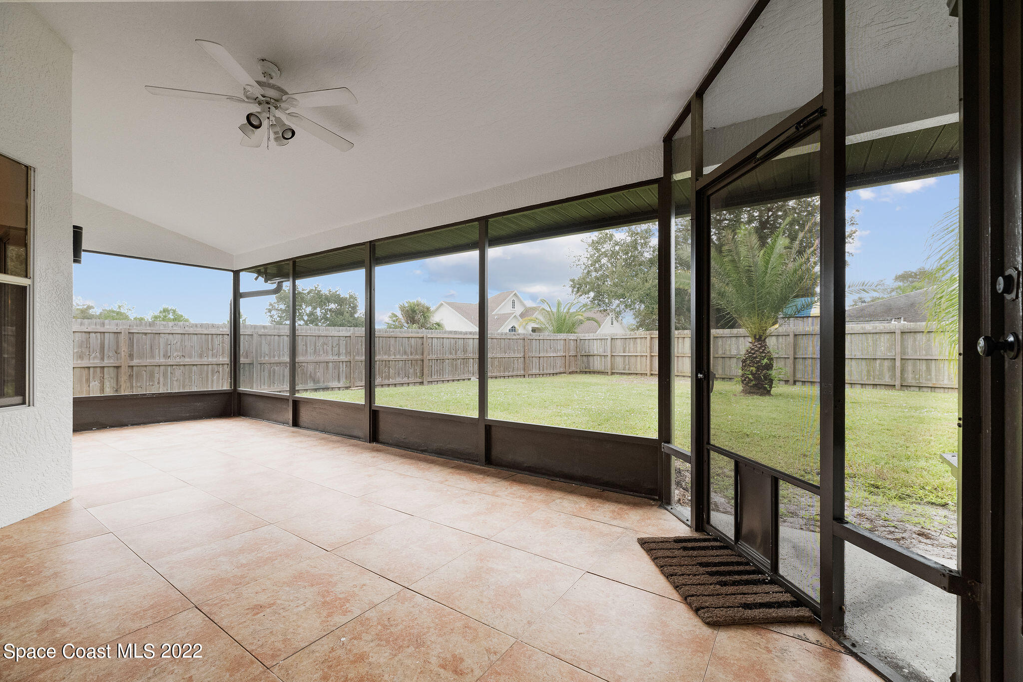 960 Falls Trail Malabar, FL 32950 - Photo 59 of 70 a view of an empty room with windows