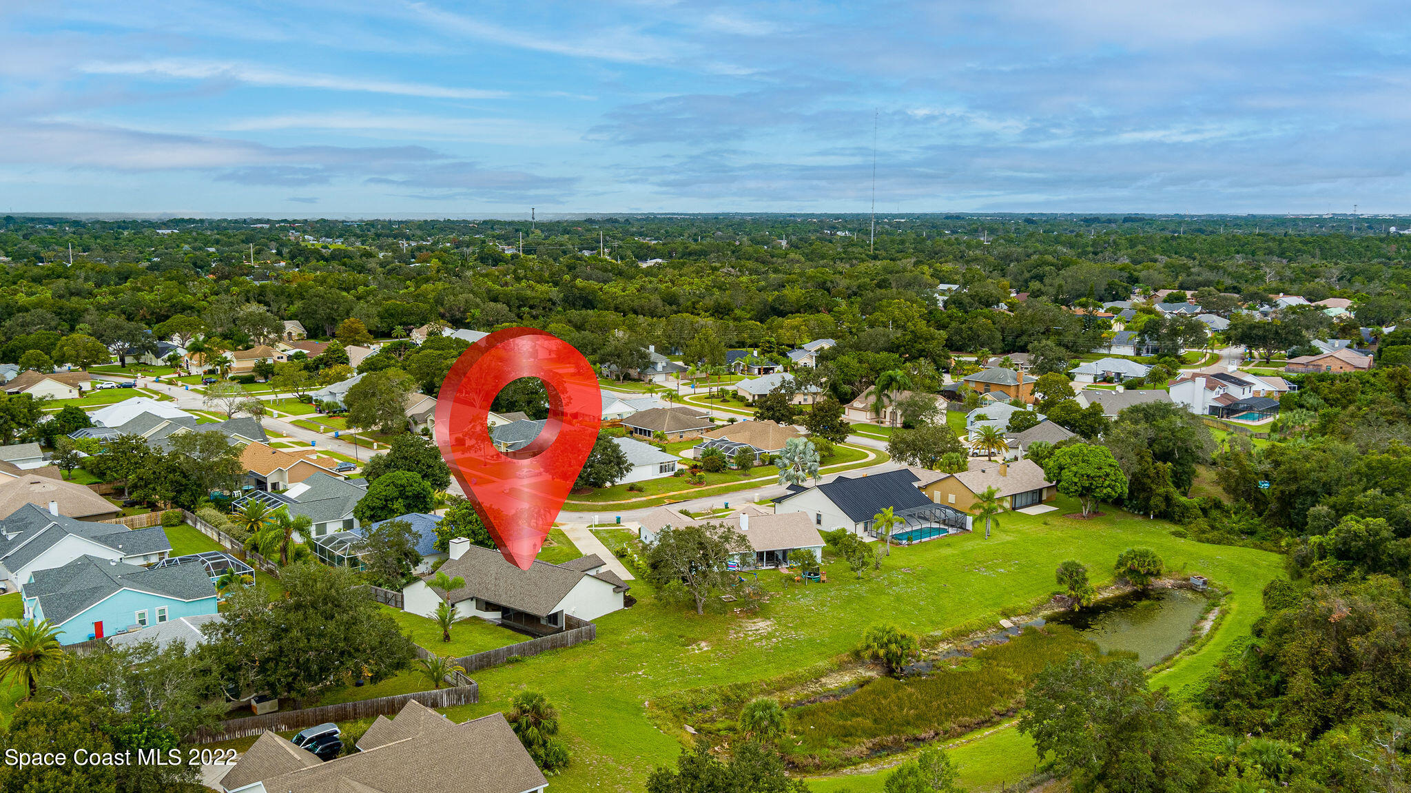 960 Falls Trail Malabar, FL 32950 - Photo 6 of 70 an aerial view of residential houses with outdoor space and trees