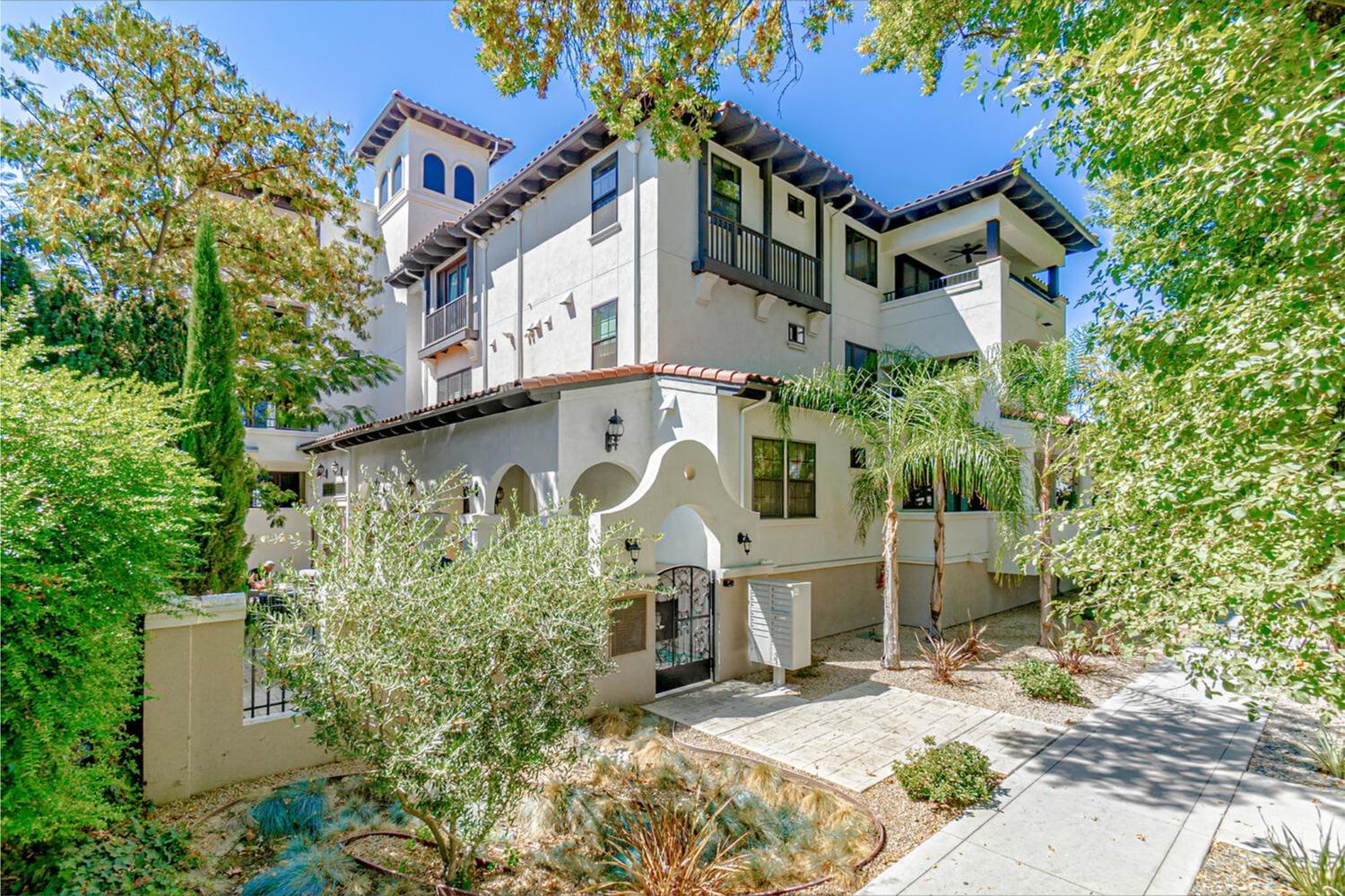 225 B Street, Unit 24 Davis, CA 95616 - Photo 1 of 1 a front view of a house with a garden