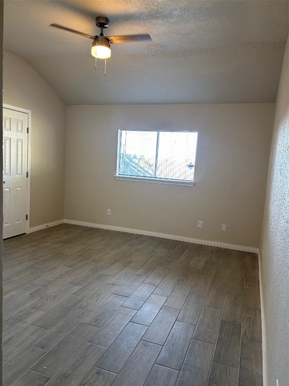 14207 Timberhaven Drive Houston, TX 77066 - Photo 14 of 14 an empty room with wooden floor and windows