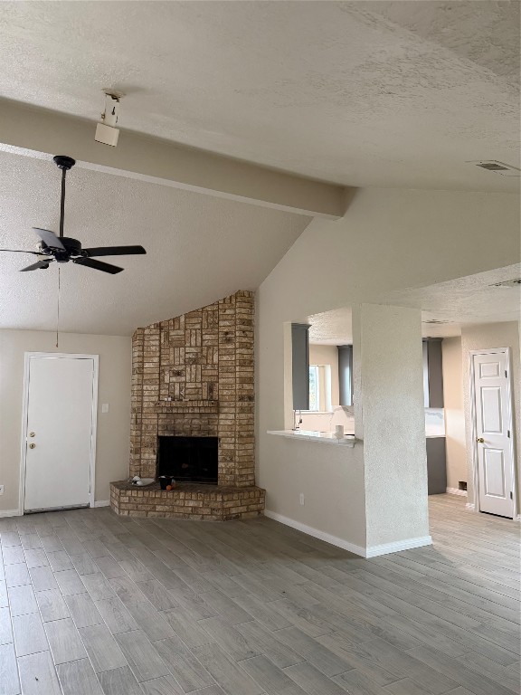 14207 Timberhaven Drive Houston, TX 77066 - Photo 3 of 14 a view of empty room with fireplace and wooden floor