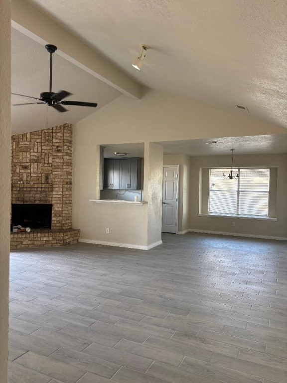 14207 Timberhaven Drive Houston, TX 77066 - Photo 7 of 14 an empty room with windows and fireplace