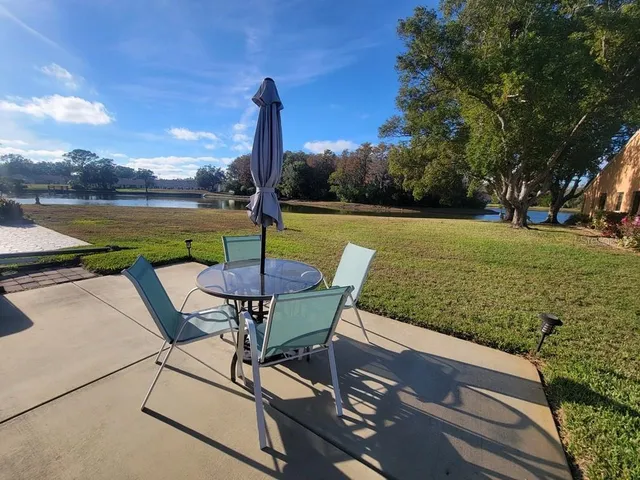a view of a chairs and table on the terrace