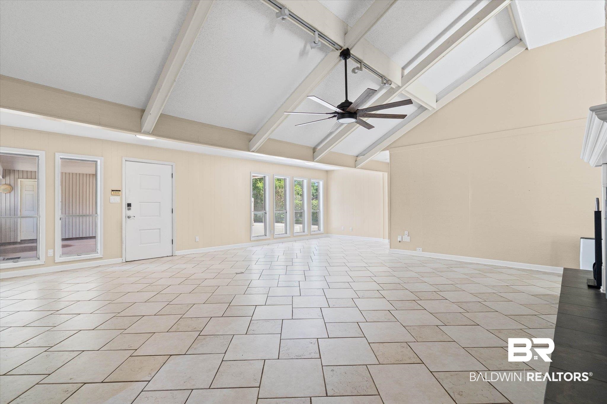 3724 Claridge Road South Mobile, AL 36608 - Photo 7 of 42 Unfurnished living room featuring lofted ceiling and ceiling fan