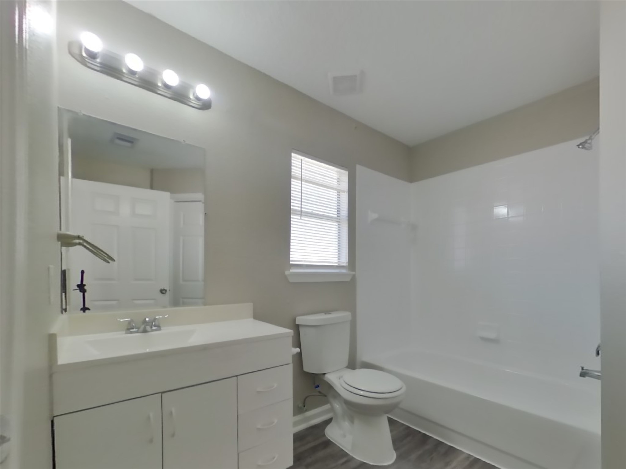 3131 Kelling Street Houston, TX 77045 - Photo 11 of 18 a bathroom with a sink a toilet and shower