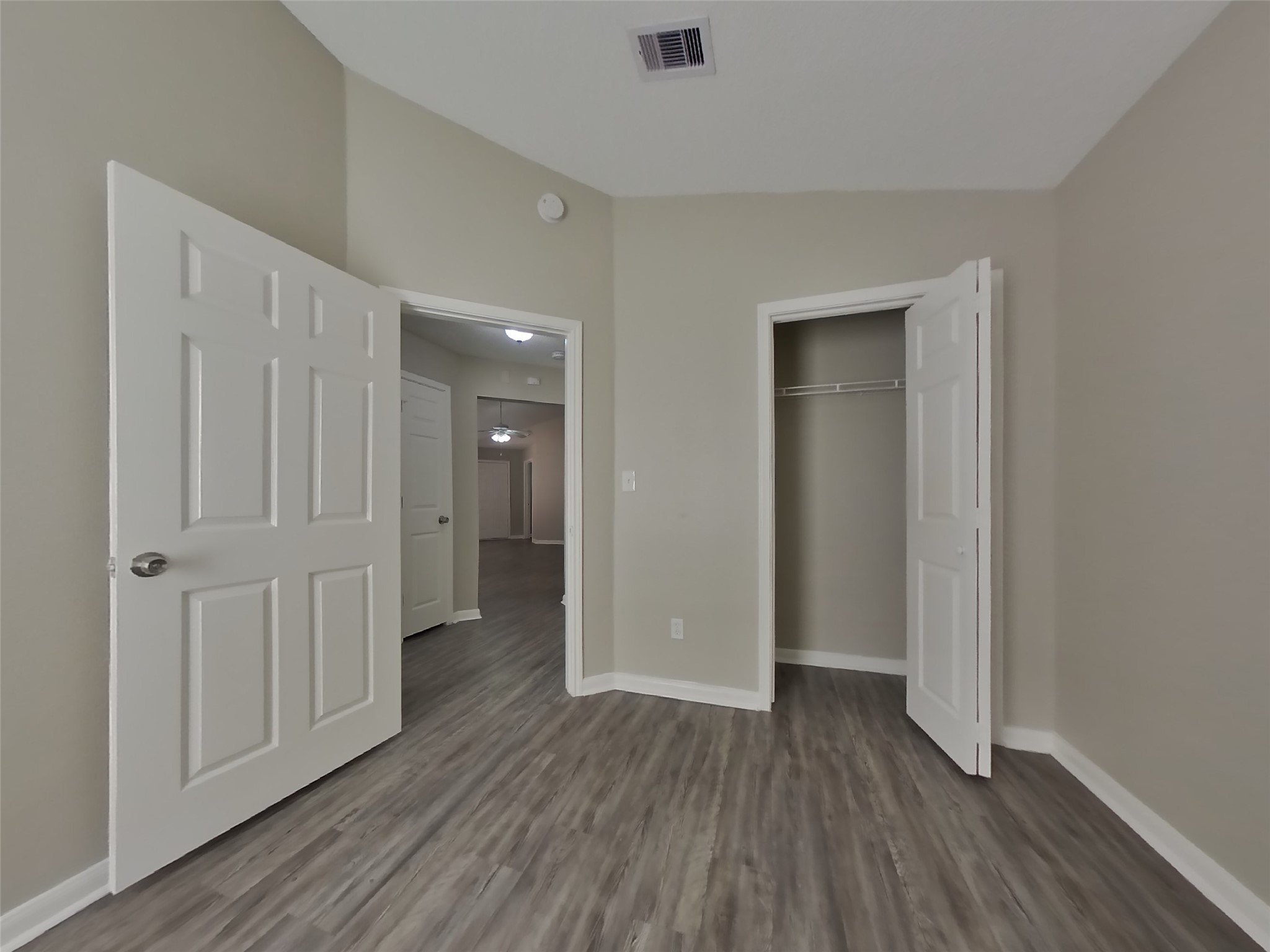 3131 Kelling Street Houston, TX 77045 - Photo 15 of 18 wooden floor with white walls