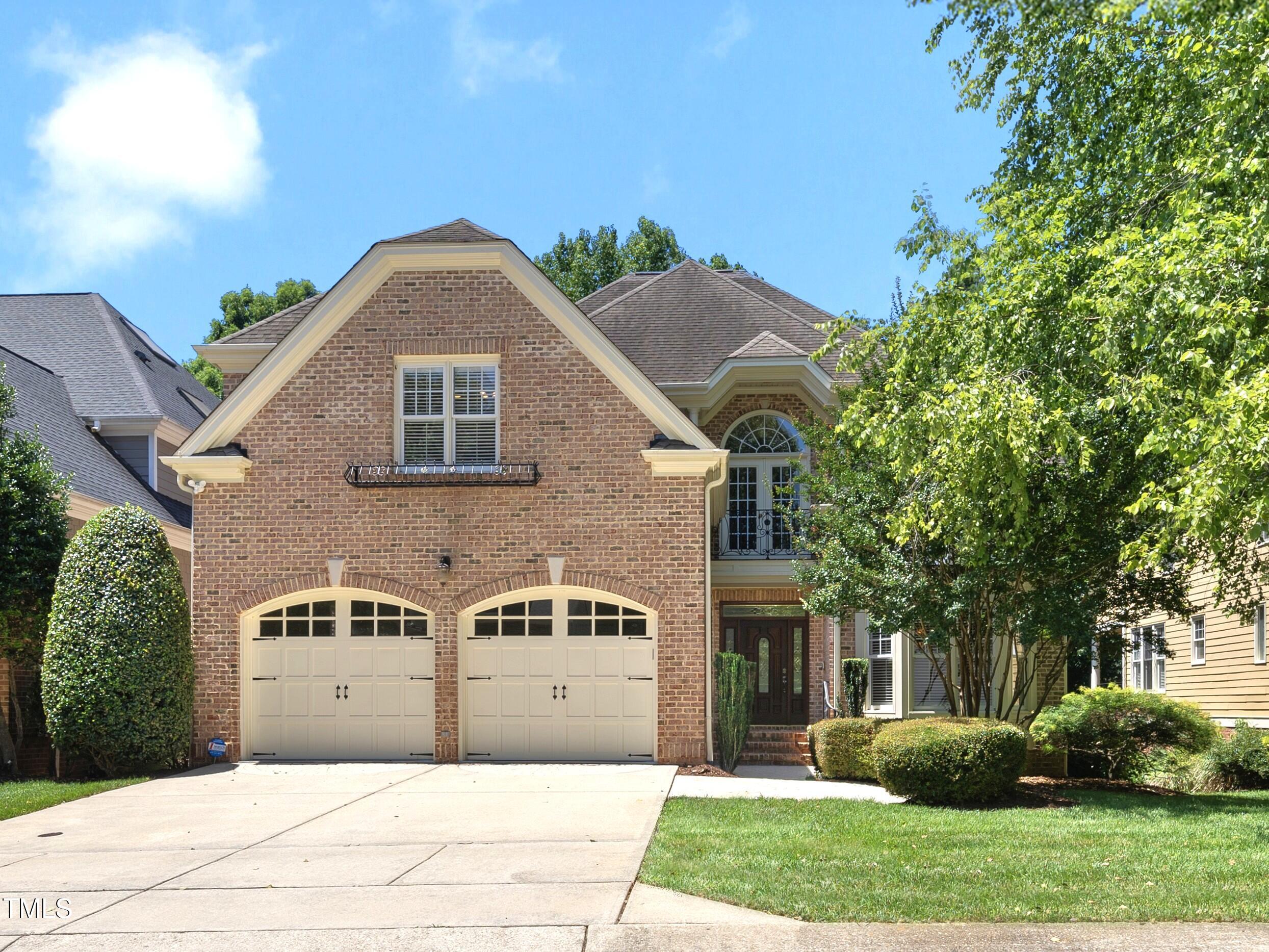 12257 Beestone Lane Raleigh, NC 27614 - Photo 1 of 59 a front view of a house with garden