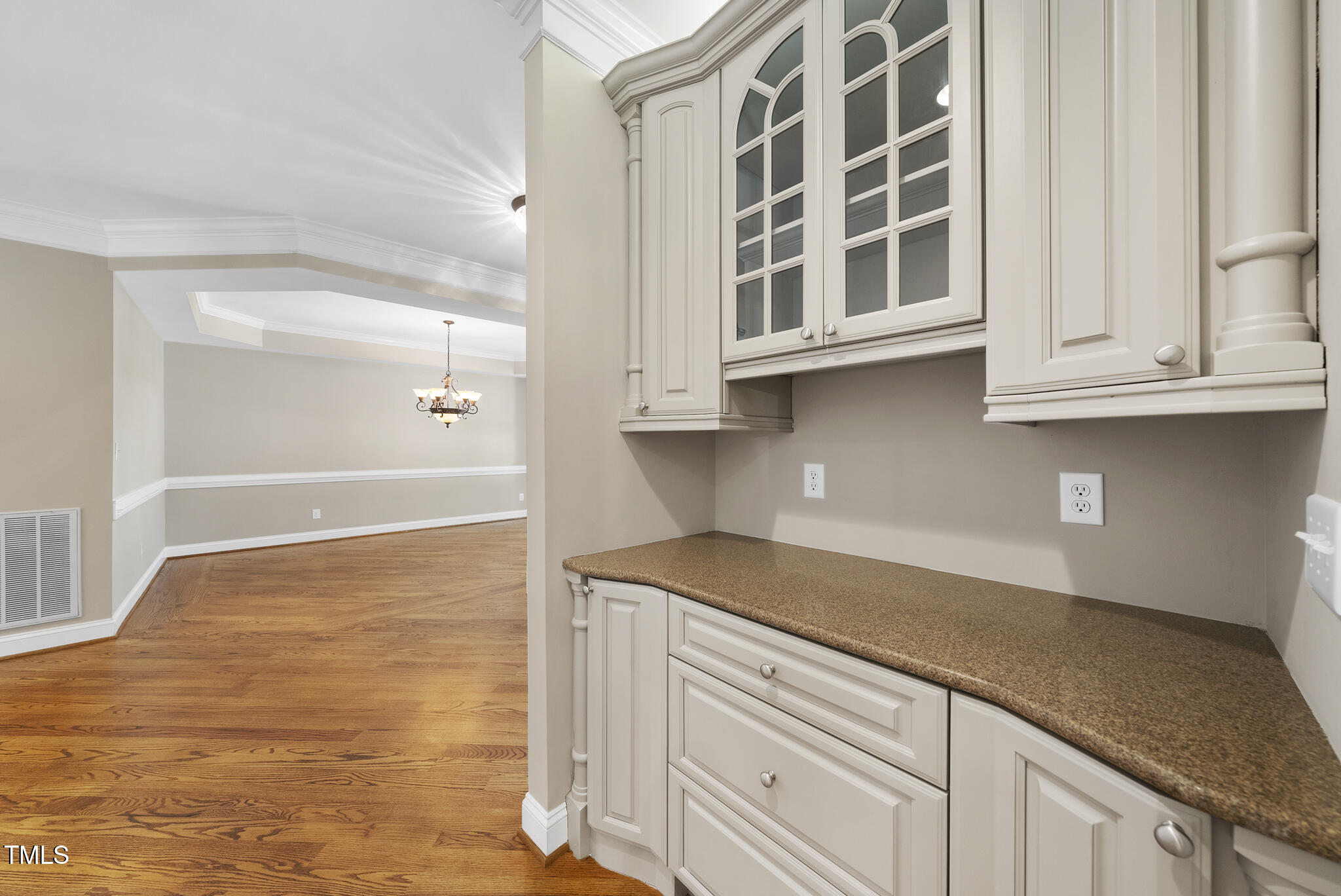 12257 Beestone Lane Raleigh, NC 27614 - Photo 8 of 59 a kitchen with granite countertop white cabinets and a sink