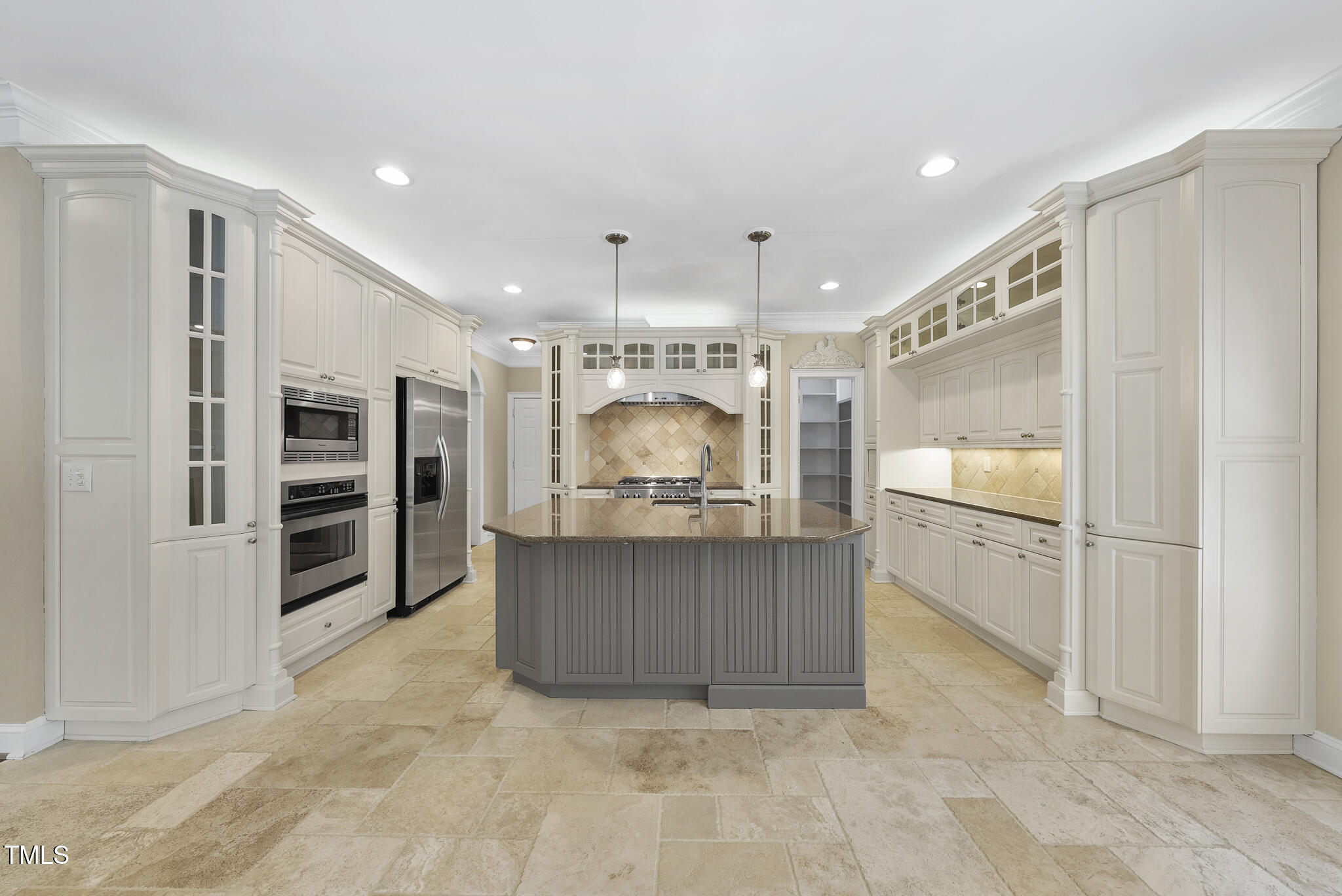 12257 Beestone Lane Raleigh, NC 27614 - Photo 9 of 59 a room with stainless steel appliances kitchen island granite countertop a refrigerator and a stove top oven