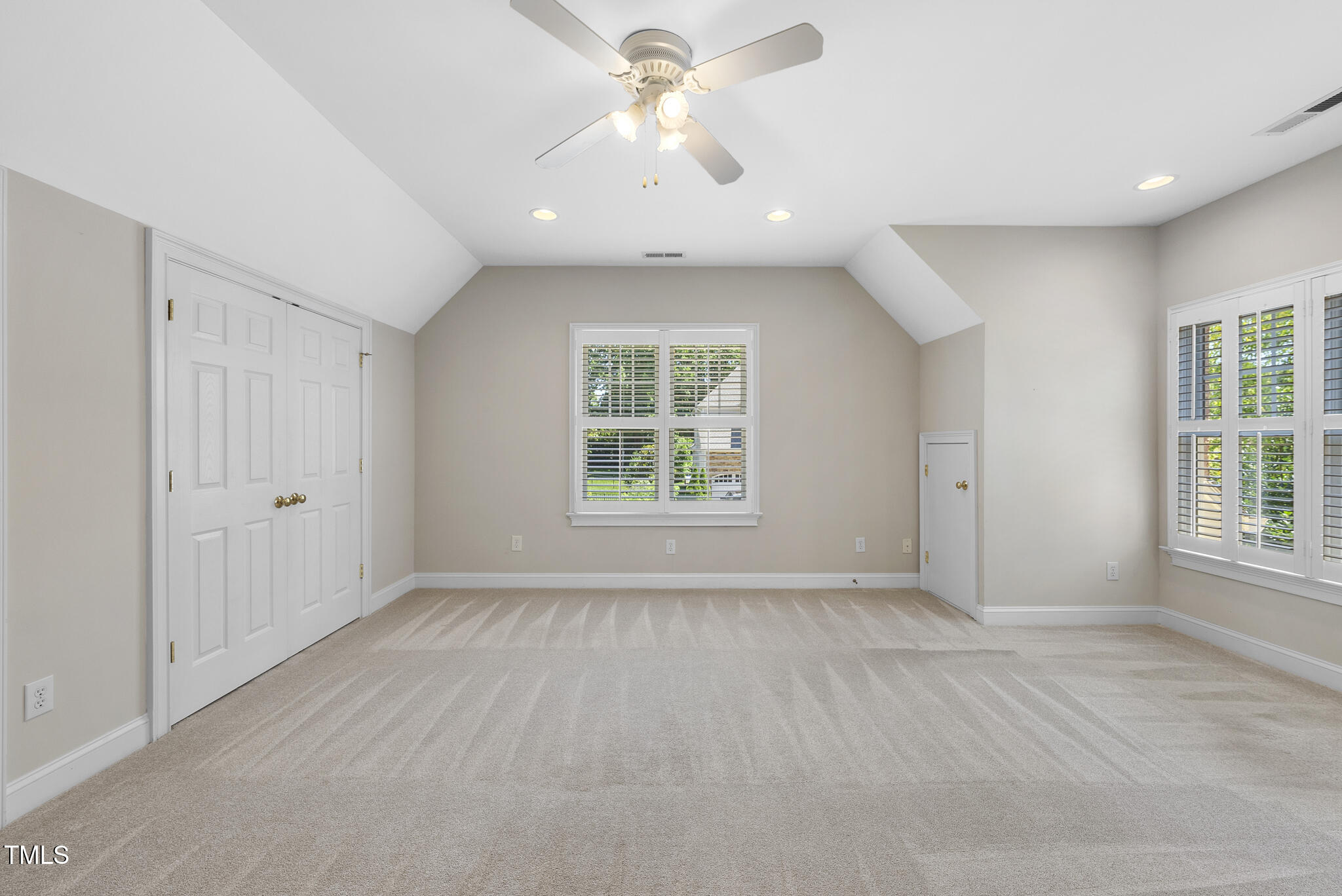 12257 Beestone Lane Raleigh, NC 27614 - Photo 34 of 59 a view of an empty room with a window