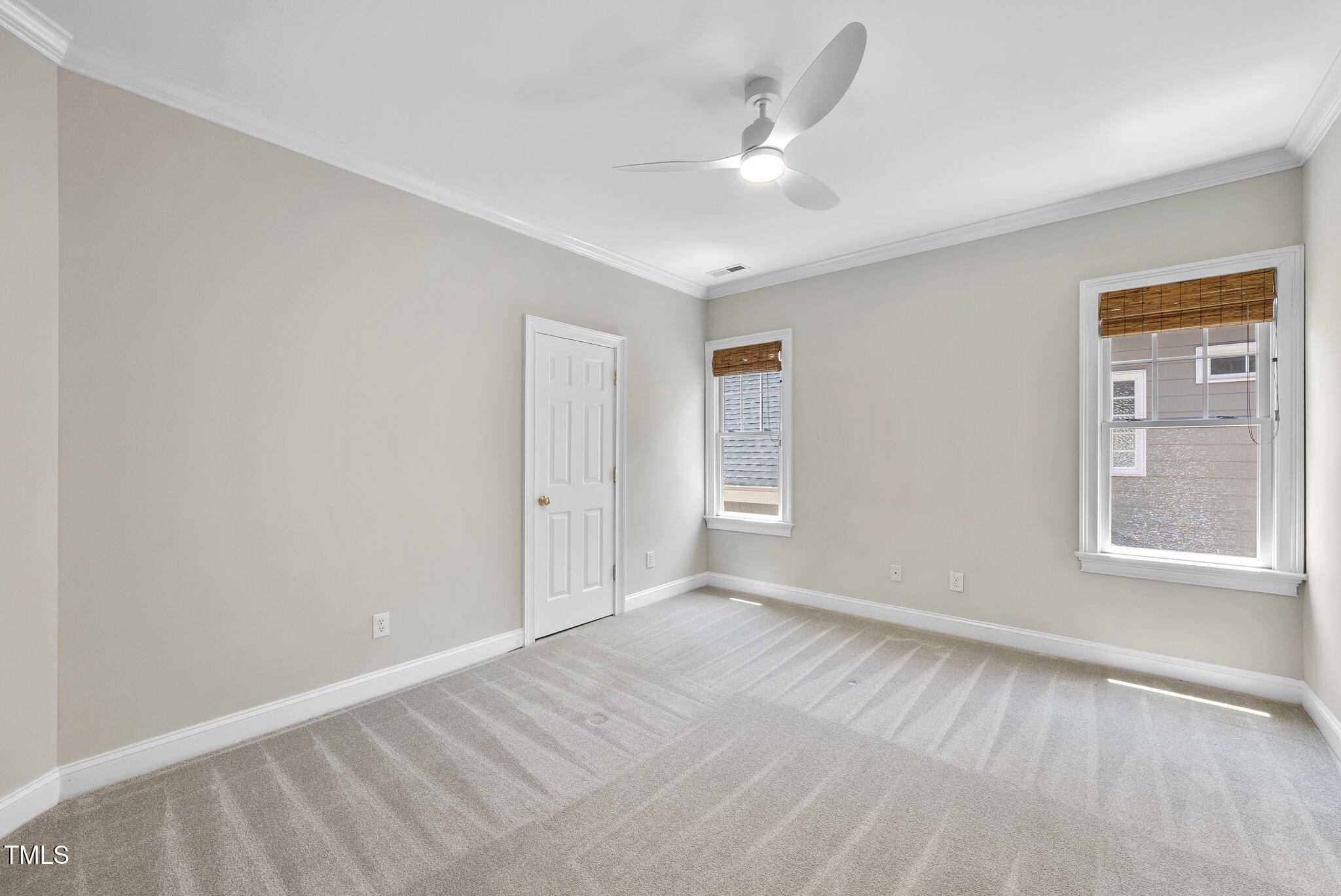 12257 Beestone Lane Raleigh, NC 27614 - Photo 36 of 59 a view of an empty room with window and wooden floor